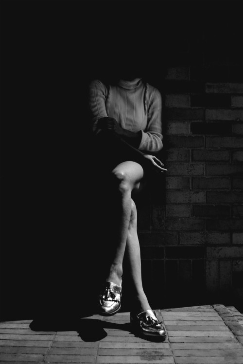 3840x5760 Black And White Shot Of Woman Sitting With Legs Wallpaper Woman Black And White 3135