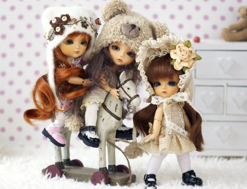 three cute dolls