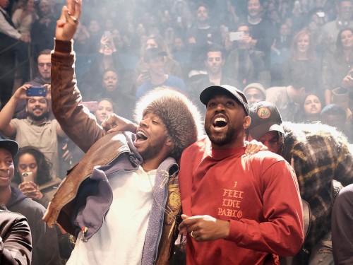 Kanye West Holding Hands Up Wallpaper