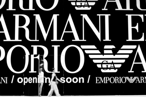 Armani Logo Background Wallpaper - Armani Logo (#975387) - HD Wallpaper &  Backgrounds Download